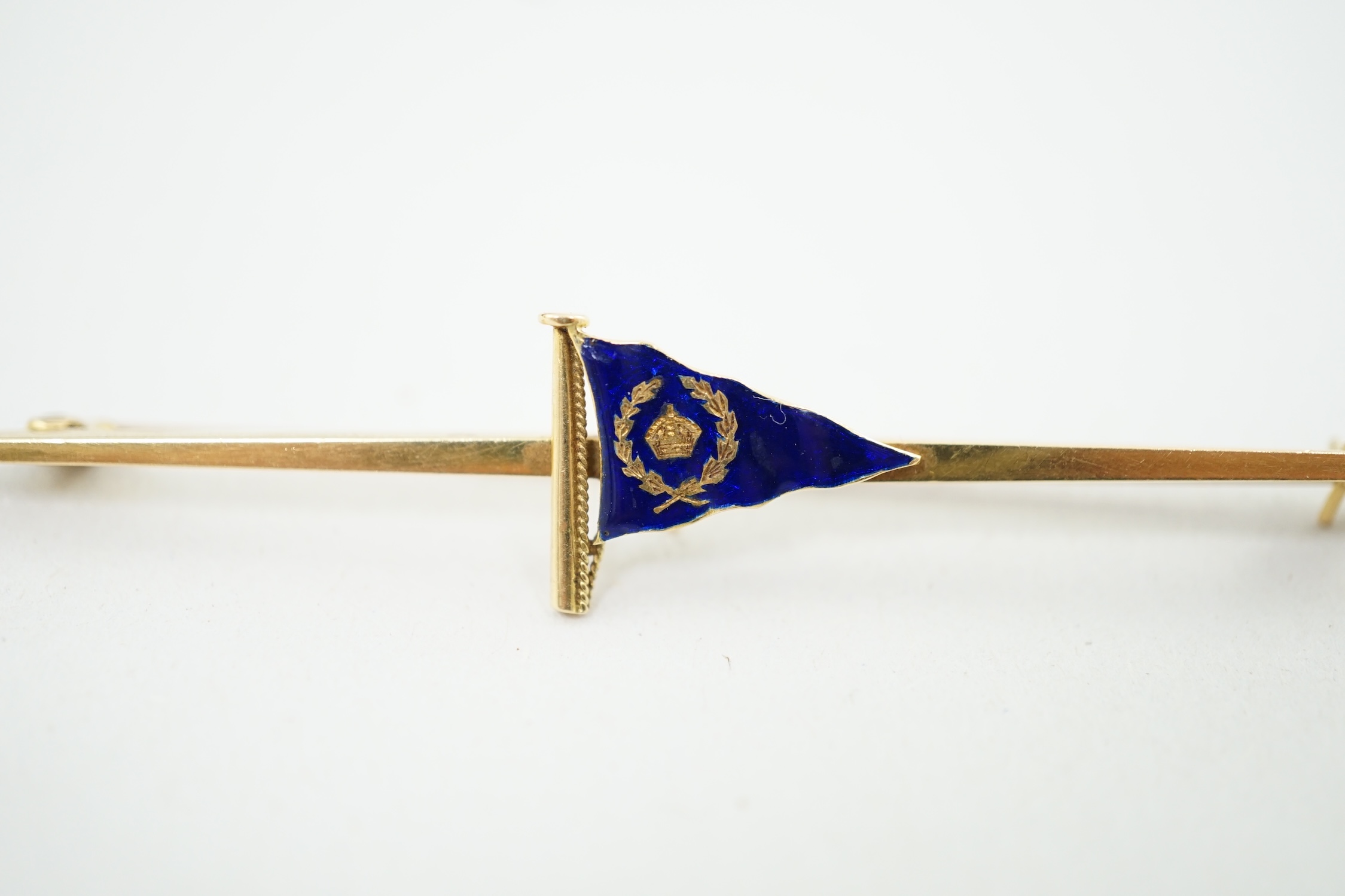 An early 20th century Benzies of Cowes 18ct gold and enamel ensign bar brooch